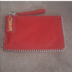 Carlos Santana clutch/wristlet. NWOT.